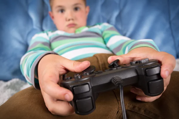 Little boy playing video games — Stock Photo, Image