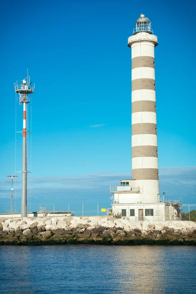 Lighthouse on the Beach Stock Image