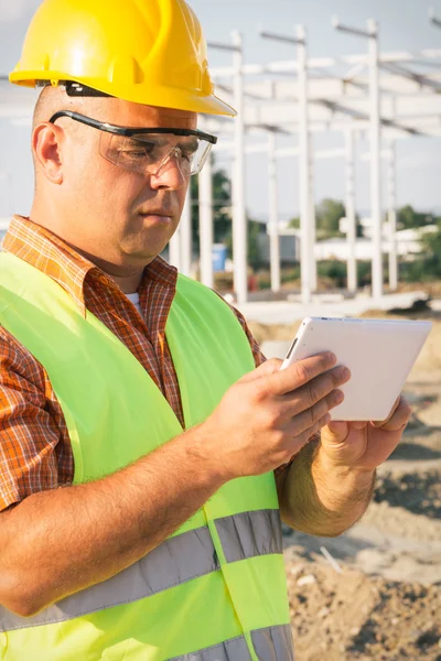 Architect On Building Site Using Digital Tablet — Stock Photo, Image