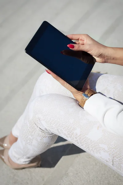 Beautiful modern businesswoman holding tablet computer — Stock Photo, Image