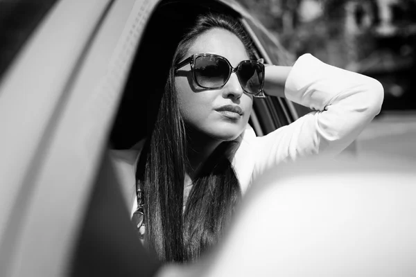 Pretty girl in a car — Stock Photo, Image