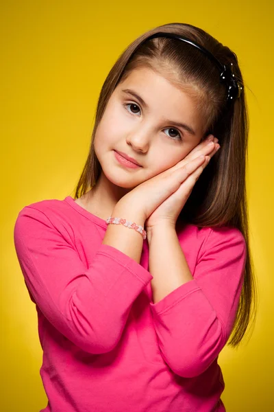 Collection of portraits of young girls on a yellow background Stock Picture