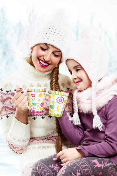 Two girl friends talk and drink tea — Stock Photo, Image