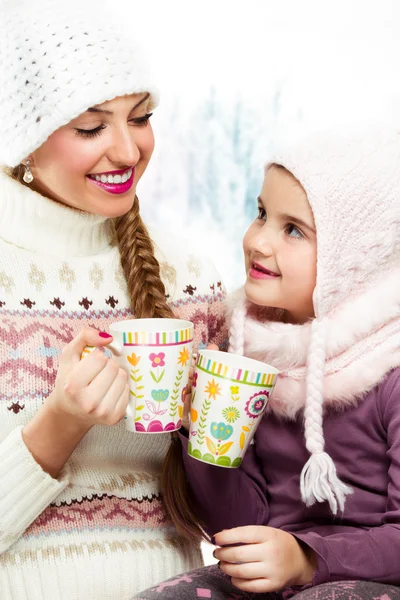 Two girl friends talk and drink tea — Stock Photo, Image