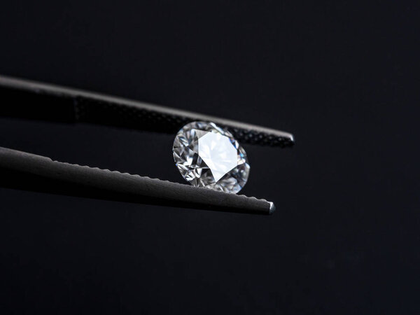closeup of diamonds on black background