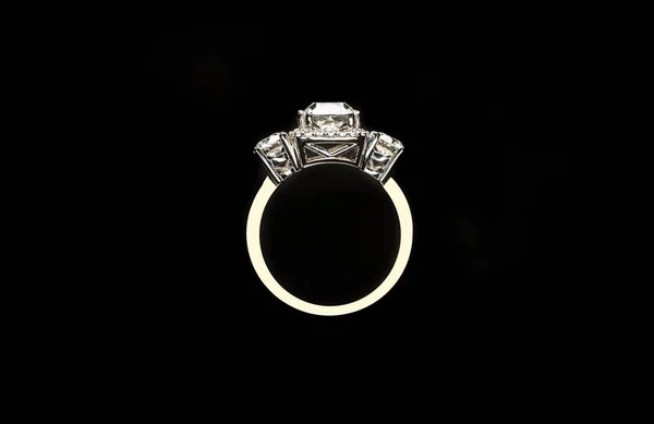 ring with diamond on black background