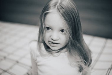 Black and white portrait of caucasian cute little girl