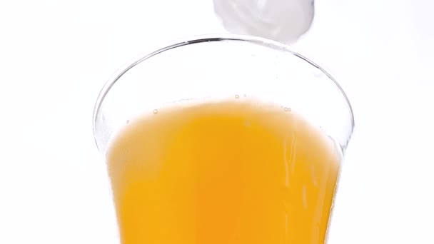 Orange Juice Glass Ice Isolated White Background — Stock Video