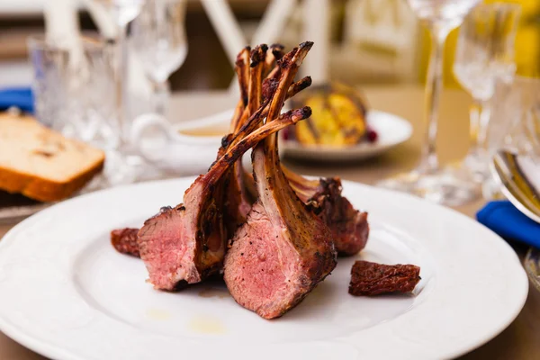 Lamb rack on a plate — Stock Photo, Image