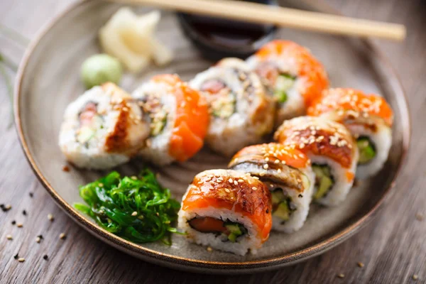 Sushi Maki Rolls Salmon Eel Avocado Cucumber Plate Chopsticks Soy — Stock Photo, Image