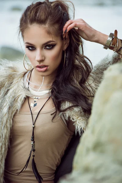 Fur coat and flash tattoos — Stock Photo, Image