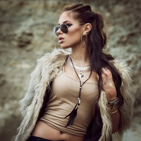 Fur coat and flash tattoos — Stock Photo, Image