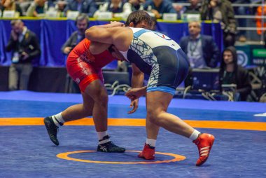 Match between Nick Gwiazdowski, Titan Mercury Wrestling Team USA vs Parviz Hadi, Wrestling Team Razi Iran during World Wrestling Club Cup, December 1, 2016, Kharkov, Ukraine