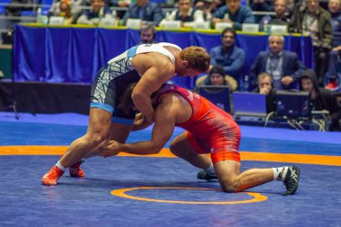 Match between Nick Gwiazdowski, Titan Mercury Wrestling Team USA vs Parviz Hadi, Wrestling Team Razi Iran during World Wrestling Club Cup, December 1, 2016, Kharkov, Ukraine
