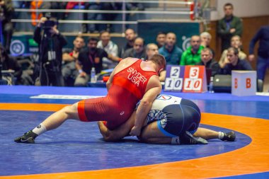 Match between Kyle Snyder, Titan Mercury Wrestling Team USA vs Abbas Tahan, Wrestling Team Razi Iran during World Wrestling Club Cup, December 1, 2016, Kharkov, Ukraine