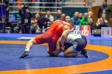 Match between Kyle Snyder, Titan Mercury Wrestling Team USA vs Abbas Tahan, Wrestling Team Razi Iran during World Wrestling Club Cup, December 1, 2016, Kharkov, Ukraine