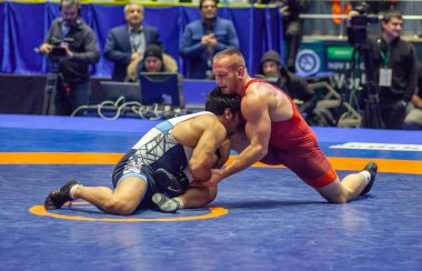 Match between Kyle Snyder, Titan Mercury Wrestling Team USA vs Abbas Tahan, Wrestling Team Razi Iran during World Wrestling Club Cup, December 1, 2016, Kharkov, Ukraine