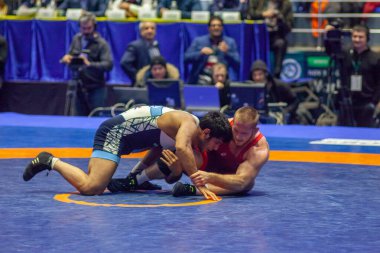 Match between Kyle Snyder, Titan Mercury Wrestling Team USA vs Abbas Tahan, Wrestling Team Razi Iran during World Wrestling Club Cup, December 1, 2016, Kharkov, Ukraine