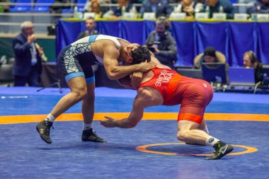 Match between Kyle Snyder, Titan Mercury Wrestling Team USA vs Abbas Tahan, Wrestling Team Razi Iran during World Wrestling Club Cup, December 1, 2016, Kharkov, Ukraine