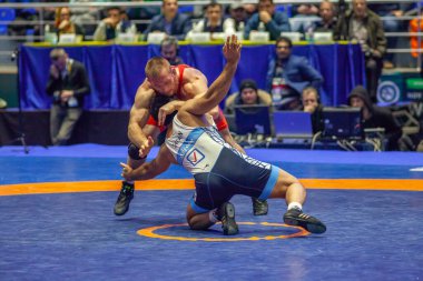 Match between Kyle Snyder, Titan Mercury Wrestling Team USA vs Abbas Tahan, Wrestling Team Razi Iran during World Wrestling Club Cup, December 1, 2016, Kharkov, Ukraine