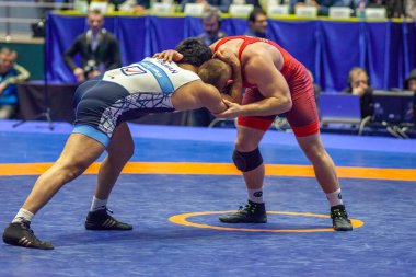 Match between Kyle Snyder, Titan Mercury Wrestling Team USA vs Abbas Tahan, Wrestling Team Razi Iran during World Wrestling Club Cup, December 1, 2016, Kharkov, Ukraine