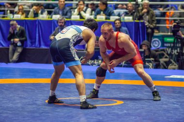 Match between Kyle Snyder, Titan Mercury Wrestling Team USA vs Abbas Tahan, Wrestling Team Razi Iran during World Wrestling Club Cup, December 1, 2016, Kharkov, Ukraine