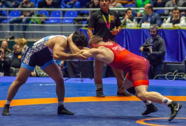 Match between Kyle Snyder, Titan Mercury Wrestling Team USA vs Abbas Tahan, Wrestling Team Razi Iran during World Wrestling Club Cup, December 1, 2016, Kharkov, Ukraine