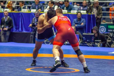 Match between Kyle Snyder, Titan Mercury Wrestling Team USA vs Abbas Tahan, Wrestling Team Razi Iran during World Wrestling Club Cup, December 1, 2016, Kharkov, Ukraine