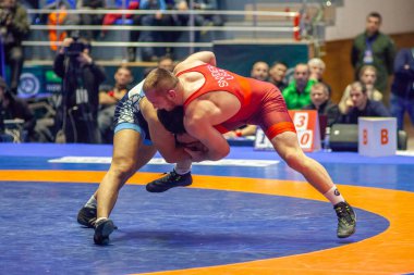 Match between Kyle Snyder, Titan Mercury Wrestling Team USA vs Abbas Tahan, Wrestling Team Razi Iran during World Wrestling Club Cup, December 1, 2016, Kharkov, Ukraine