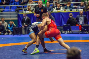 Match between David Taylor, Titan Mercury Wrestling Team USA vs Alireza Karimimachiani, Wrestling Team Razi Iran during World Wrestling Club Cup, December 1, 2016, Kharkov, Ukraine