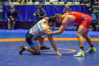 Match between David Taylor, Titan Mercury Wrestling Team USA vs Alireza Karimimachiani, Wrestling Team Razi Iran during World Wrestling Club Cup, December 1, 2016, Kharkov, Ukraine