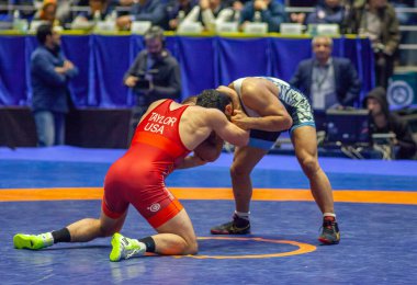 Match between David Taylor, Titan Mercury Wrestling Team USA vs Alireza Karimimachiani, Wrestling Team Razi Iran during World Wrestling Club Cup, December 1, 2016, Kharkov, Ukraine