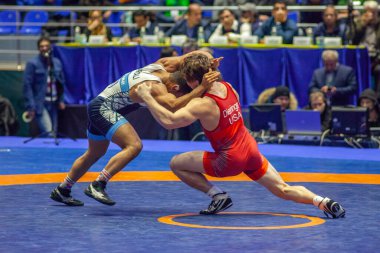 Match between Alex Dieringer, Titan Mercury Wrestling Team USA vs Afzali, Wrestling Team Razi Iran during World Wrestling Club Cup, December 1, 2016, Kharkov, Ukraine