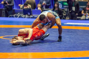 Match between Alex Dieringer, Titan Mercury Wrestling Team USA vs Afzali, Wrestling Team Razi Iran during World Wrestling Club Cup, December 1, 2016, Kharkov, Ukraine