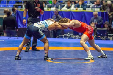 Match between Alex Dieringer, Titan Mercury Wrestling Team USA vs Afzali, Wrestling Team Razi Iran during World Wrestling Club Cup, December 1, 2016, Kharkov, Ukraine