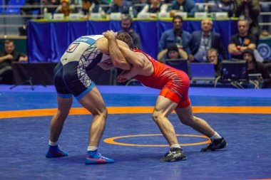 Match between Nazar Kulchytskyy, Titan Mercury Wrestling Team USA vs Atsamaz Sanakoev, Wrestling Team Razi Iran during World Wrestling Club Cup, December 1, 2016, Kharkov, Ukraine