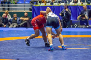 Match between Nazar Kulchytskyy, Titan Mercury Wrestling Team USA vs Atsamaz Sanakoev, Wrestling Team Razi Iran during World Wrestling Club Cup, December 1, 2016, Kharkov, Ukraine