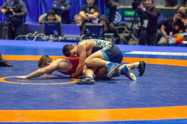 Match between Nazar Kulchytskyy, Titan Mercury Wrestling Team USA vs Atsamaz Sanakoev, Wrestling Team Razi Iran during World Wrestling Club Cup, December 1, 2016, Kharkov, Ukraine