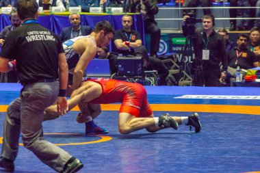 Match between Nazar Kulchytskyy, Titan Mercury Wrestling Team USA vs Atsamaz Sanakoev, Wrestling Team Razi Iran during World Wrestling Club Cup, December 1, 2016, Kharkov, Ukraine
