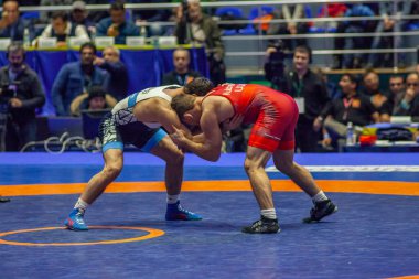 Match between Nazar Kulchytskyy, Titan Mercury Wrestling Team USA vs Atsamaz Sanakoev, Wrestling Team Razi Iran during World Wrestling Club Cup, December 1, 2016, Kharkov, Ukraine