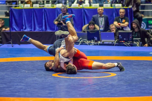 Match between Nazar Kulchytskyy, Titan Mercury Wrestling Team USA vs Atsamaz Sanakoev, Wrestling Team Razi Iran during World Wrestling Club Cup, December 1, 2016, Kharkov, Ukraine