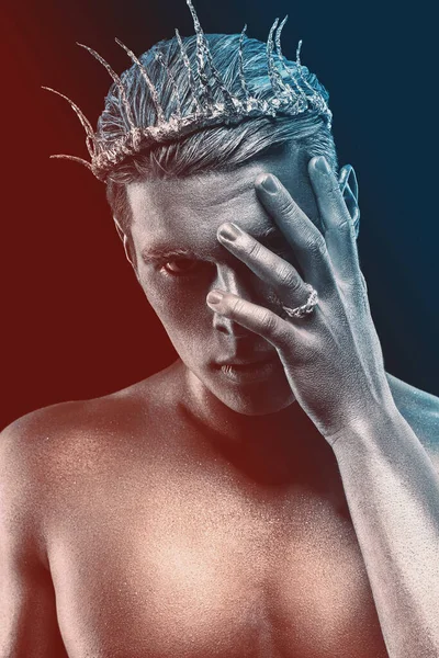 Beauty style portrait of man isolated at dark background. Art creative Makeup. Hairstyle and skincare concept.	