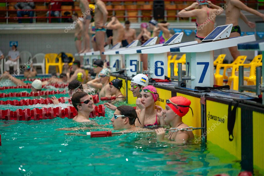 Swimmers practicing in pool during Winter swimming Championship of Ukraine, March 7, 2021, Kharkov, Ukraine, swimming pool 