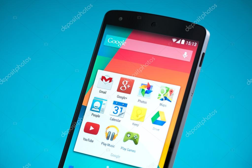 Kiev, Ukraine - September 22, 2014: Close-up shot of brand new Google Nexus 5, powered by Android 4.4 version, manufactured by LG Electronics. Isolated on blue background.