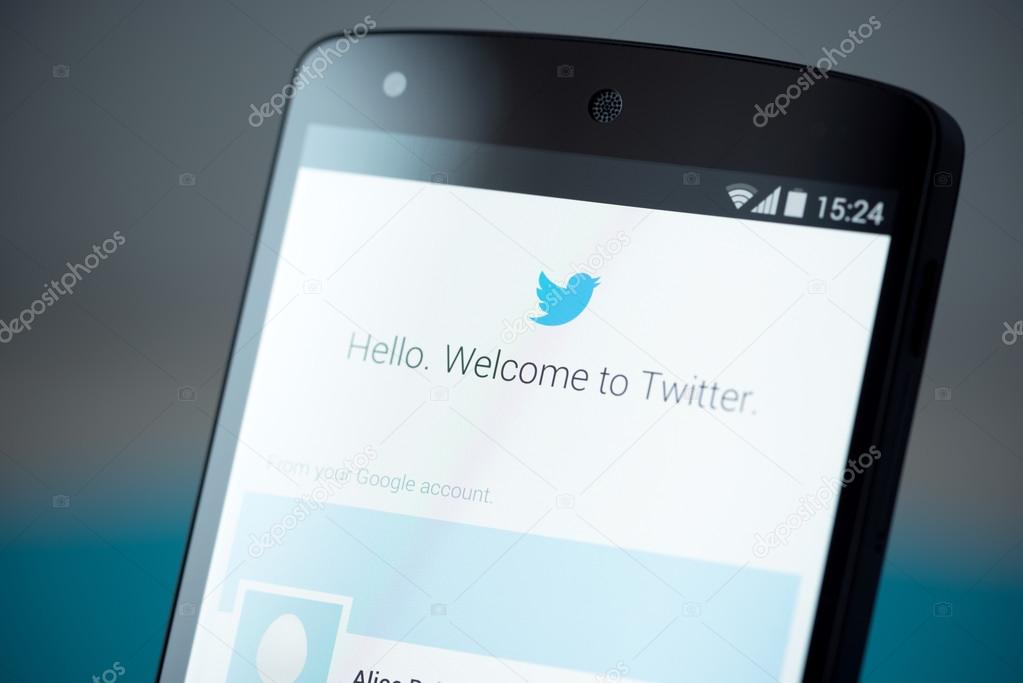 Kiev, Ukraine - September 22, 2014: Close-up photo of brand new Google Nexus 5, powered by Android 4.4 version, with Twitter login account page on a screen.