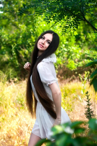 Girl in a white dress — Stock Photo, Image