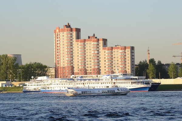 View of Neva River and river cruise ship.