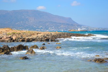 Dağlar ve Ege deniz kıyıları.