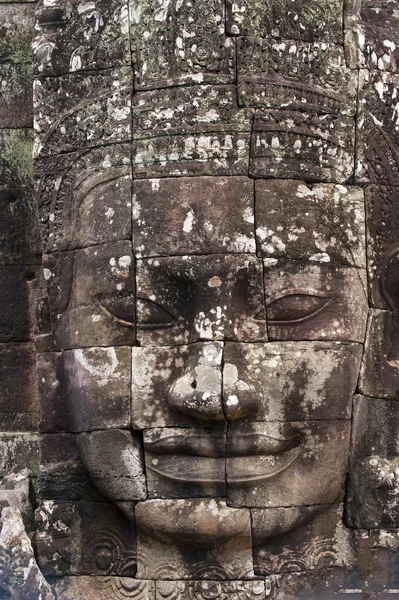 Ancient stone face of Bayon temple — Stock Photo, Image