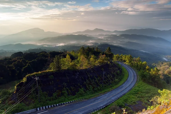 Sunrise over the mountains at Doi Inthanon — Stock Photo, Image